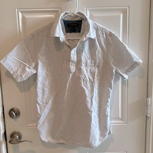 Used. Good condition. Casual shirt with buttons. Grey-white. Men’s small.